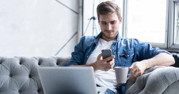 Man using open banking to check his finances