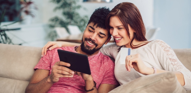 Couple comparing credit deals